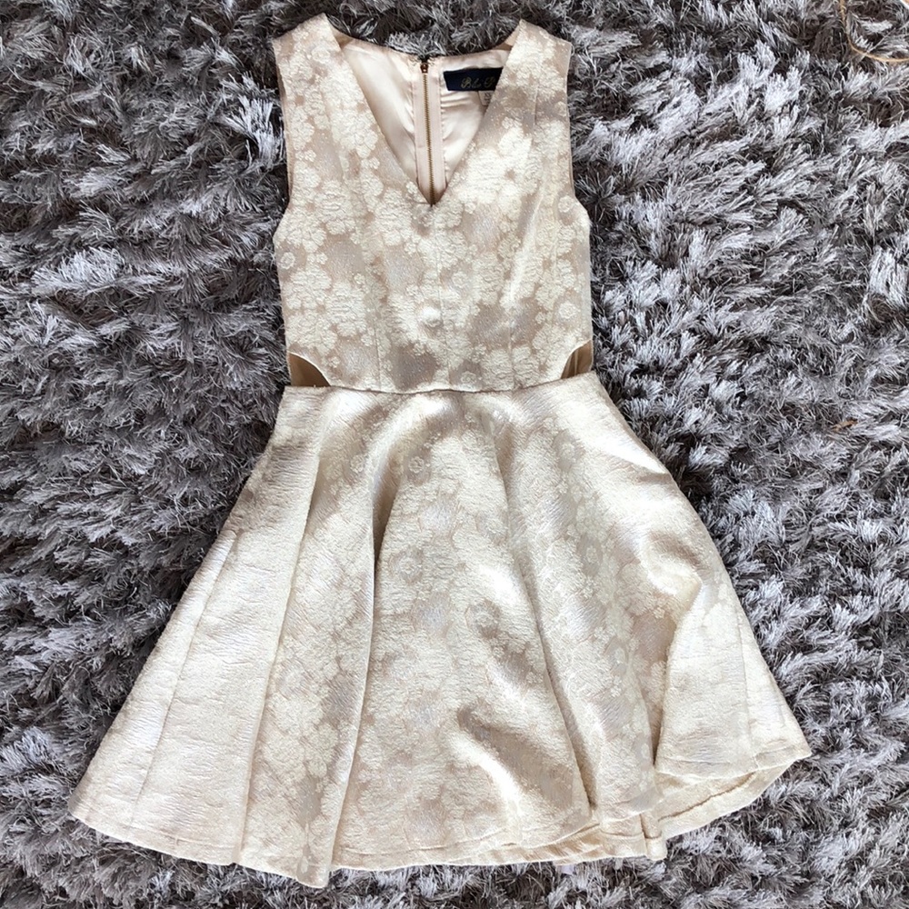 Francesca’s Shimmery W/ cutouts (XS) holiday